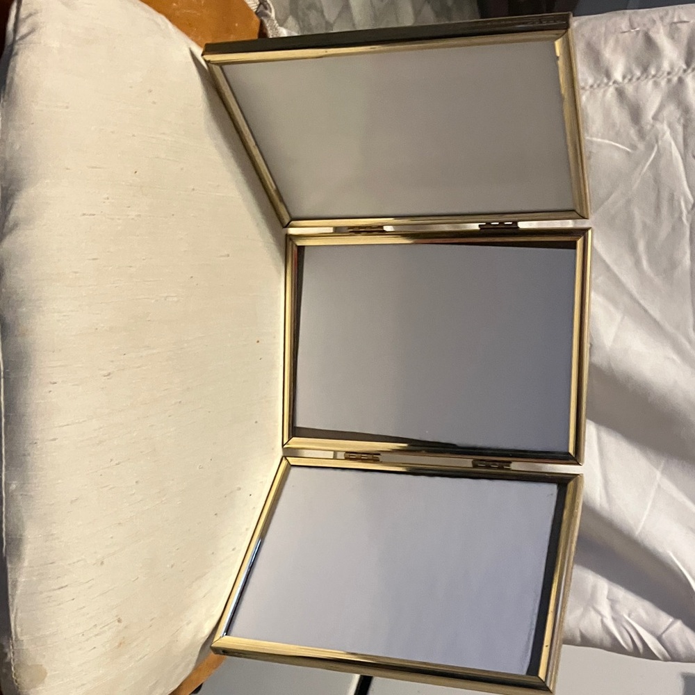 Nice 3 in 1.  3 5”-7” glass n gold tone frames attached together. Perfect